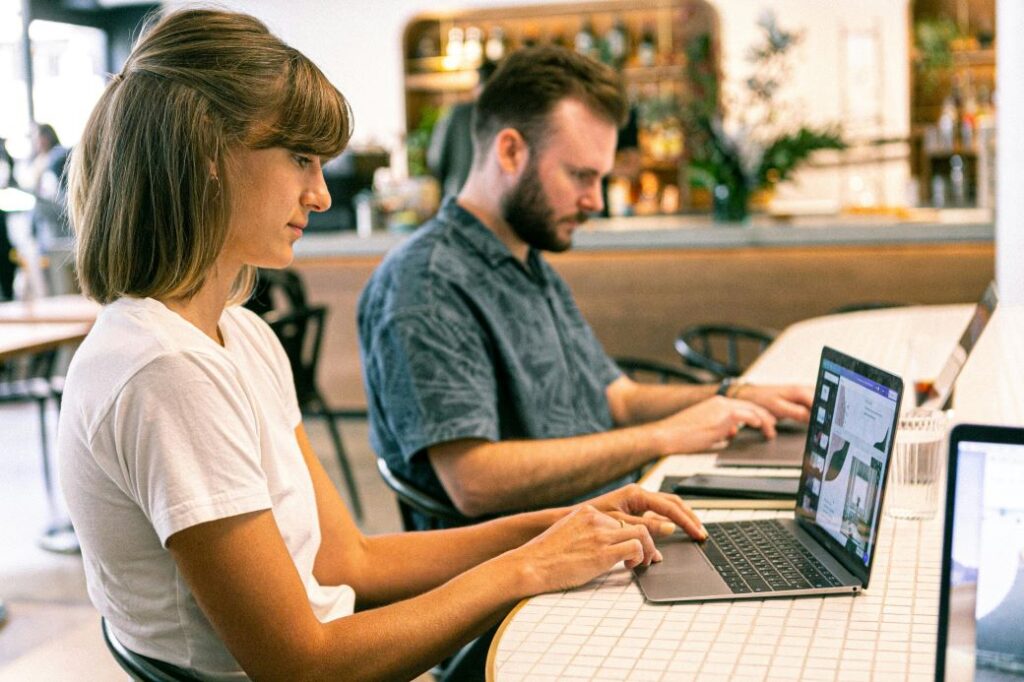 Two Marketing professionals working at a desk in London