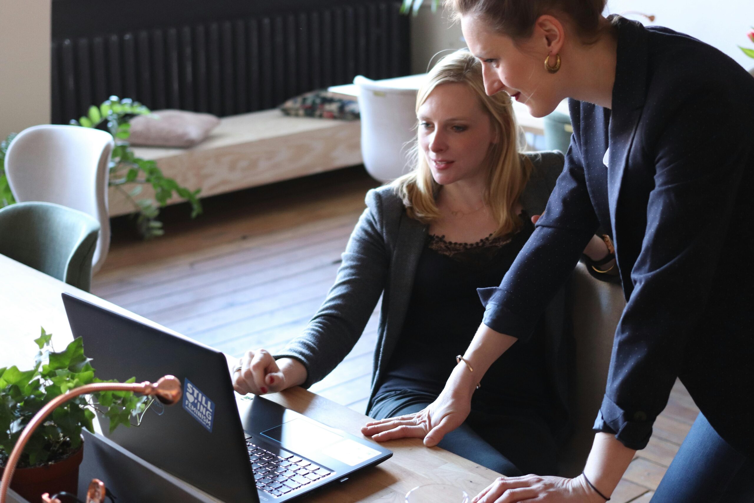picture of a female sales representative meeting a client